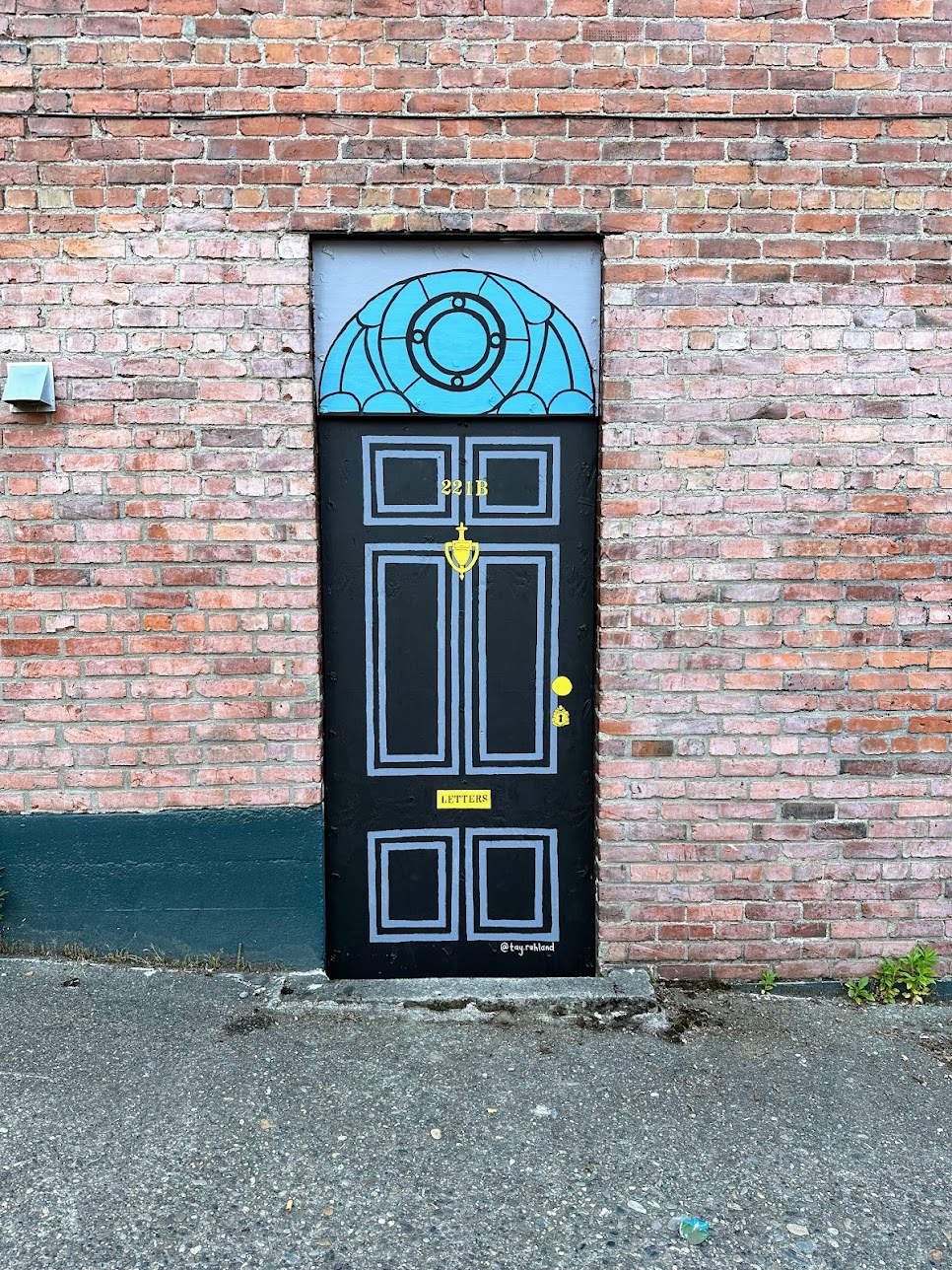 Baker Street door mural featuring colorful artistic design on residential building