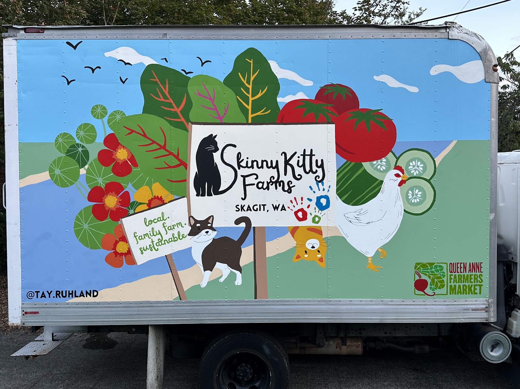 Skinny Kitty Farms truck mural featuring farm animals and agricultural themes